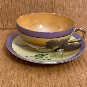 Hand painted Cup and Saucer